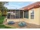 House exterior showing screened patio area at 14131 W Circle Ridge Dr, Sun City West, AZ 85375