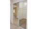 Large walk-in closet with mirrored doors and shelving at 14131 W Circle Ridge Dr, Sun City West, AZ 85375