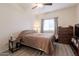 Bedroom with double bed, dresser, and nightstand at 145 N 74Th St # 207, Mesa, AZ 85207