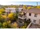 Two-story home with deck, patio furniture, and landscaping at 16025 E Primrose Dr # B, Fountain Hills, AZ 85268