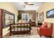 Bedroom with a red chair and large mirror at 16025 E Primrose Dr # B, Fountain Hills, AZ 85268