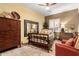 Spacious bedroom with wood furniture and ceiling fan at 16025 E Primrose Dr # B, Fountain Hills, AZ 85268