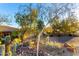 Landscaped yard with cacti and a view of a Spanish-style home at 16025 E Primrose Dr # B, Fountain Hills, AZ 85268