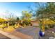 Spanish-style home with a two-car garage and desert landscaping at 16025 E Primrose Dr # B, Fountain Hills, AZ 85268