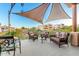 Relaxing patio with wicker furniture and shade structure at 16025 E Primrose Dr # B, Fountain Hills, AZ 85268