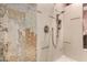 Walk-in shower with modern fixtures and tile surround at 16025 E Primrose Dr # B, Fountain Hills, AZ 85268