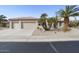 Single-story home with three-car garage and desert landscaping at 16036 W Sandia Park Dr, Surprise, AZ 85374