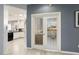 Modern kitchen with white cabinets partially visible at 16036 W Sandia Park Dr, Surprise, AZ 85374