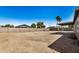 Large backyard with covered patio and block wall at 1653 N 69Th Ave, Phoenix, AZ 85035