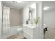 Clean bathroom with bathtub, shower and modern vanity at 1717 N 1St Ave # 215, Phoenix, AZ 85003