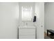 Small, modern bathroom with floating vanity and LED-lit mirror at 1717 N 1St Ave # 215, Phoenix, AZ 85003