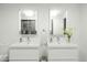 Modern bathroom with double vanity and contemporary lighting at 1717 N 1St Ave # 215, Phoenix, AZ 85003