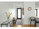 Bright entryway with modern console table and bench at 1717 N 1St Ave # 215, Phoenix, AZ 85003