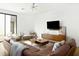 Modern living room with leather sofa and mid-century modern style at 1717 N 1St Ave # 215, Phoenix, AZ 85003