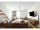 Mid-century modern living room with leather sofa at 1717 N 1St Ave # 215, Phoenix, AZ 85003