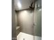 Modern shower with built-in seat and glass enclosure at 1717 N 1St Ave # 215, Phoenix, AZ 85003