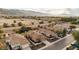 Aerial view of house and neighborhood with mountain view at 2023 E Fawn Dr, Phoenix, AZ 85042