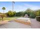 Backyard oasis with hot tub, putting green, and fountain at 2023 E Fawn Dr, Phoenix, AZ 85042