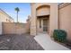 Front entry with security gate and desert landscaping at 2023 E Fawn Dr, Phoenix, AZ 85042