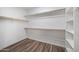 Large walk-in closet with ample shelving and hanging space at 2023 E Fawn Dr, Phoenix, AZ 85042