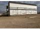 Unfinished exterior side wall of new construction home at 21032 W Skinner Rd, Wittmann, AZ 85361