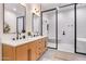 Modern bathroom with double vanity and large shower at 21086 E Mewes Rd, Queen Creek, AZ 85142