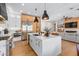 Modern kitchen with stainless steel appliances and large island at 21086 E Mewes Rd, Queen Creek, AZ 85142