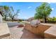 Outdoor kitchen and fire pit area at 21086 E Mewes Rd, Queen Creek, AZ 85142