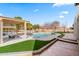 Large pool with grassy area and pergola at 21086 E Mewes Rd, Queen Creek, AZ 85142