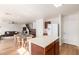 Open concept with kitchen island flowing into the living room at 2159 S Luther --, Mesa, AZ 85209