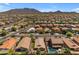 Aerial view of house and neighborhood at 2218 E Gillcrest Rd, Gilbert, AZ 85298