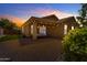 Covered patio, string lights, and grassy backyard at 2218 E Gillcrest Rd, Gilbert, AZ 85298