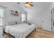 Large bedroom with king-size bed and plenty of natural light at 2218 E Gillcrest Rd, Gilbert, AZ 85298