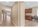 Bright entryway with tile floors offering views into the living areas and kitchen at 2218 E Gillcrest Rd, Gilbert, AZ 85298