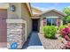 House entrance with stonework and landscaping at 2218 E Gillcrest Rd, Gilbert, AZ 85298