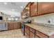 Kitchen boasts granite countertops and ample cabinetry at 2218 E Gillcrest Rd, Gilbert, AZ 85298