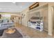 Open living area with a neutral color palette and built-in shelving at 2218 E Gillcrest Rd, Gilbert, AZ 85298