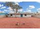 Backyard view of home, red rock coverage at 252 S Cholla St, Gilbert, AZ 85233