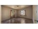 Bright bedroom with two windows and concrete floors at 2533 E Cheery Lynn Rd, Phoenix, AZ 85016