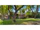 Brick home nestled among large trees at 2533 E Cheery Lynn Rd, Phoenix, AZ 85016