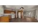 Simple kitchen featuring wood cabinets and white appliances at 2533 E Cheery Lynn Rd, Phoenix, AZ 85016