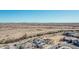 Aerial view showing a house, neighborhood, and surrounding desert landscape at 25509 N 140Th Dr, Surprise, AZ 85387