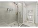 Clean bathroom with walk-in shower and bench at 25509 N 140Th Dr, Surprise, AZ 85387