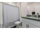 Clean bathroom with gray vanity and shower/tub combo at 25509 N 140Th Dr, Surprise, AZ 85387