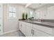 Modern bathroom with vanity, sink, and large mirror at 25509 N 140Th Dr, Surprise, AZ 85387