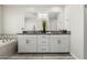 Modern bathroom with double vanity and soaking tub at 25509 N 140Th Dr, Surprise, AZ 85387