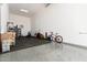 Finished garage with home gym and exercise equipment at 25509 N 140Th Dr, Surprise, AZ 85387