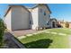 Two story house with a backyard and landscaping at 25509 N 140Th Dr, Surprise, AZ 85387