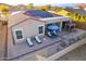 Aerial view of house with solar panels and backyard patio at 26063 N 83Rd Dr, Peoria, AZ 85383