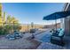 Relaxing backyard oasis with water feature and seating area at 26063 N 83Rd Dr, Peoria, AZ 85383